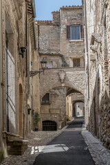picturesque steep uphill street at medieval hilltop little town, Amelia, Italy