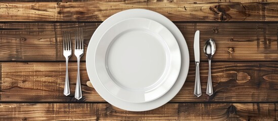 Top view of an empty white porcelain plate with cutlery on a wooden table with copy space image