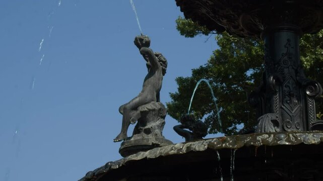Figurines of fountain at Fountain Square Park in Bowling Green