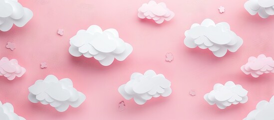 White paper cut out clouds set against a pink background Flat lay mock up copyspace