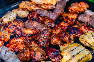 grilled meat over the coals on barbecue