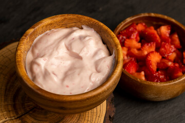fresh natural yogurt with added strawberry flavor with berries