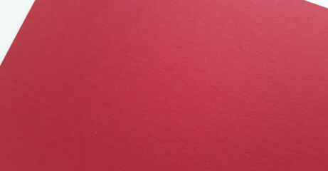 abstract red color paper texture, close-up clear textured surface, beautiful clean background and wallpaper with space for design