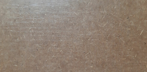 abstract cardboard texture with particles, wooden background close-up surface with space for design