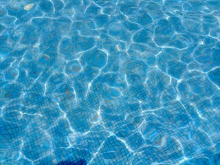 Ifrane, Morocco - August 04, 2024: The magic of blue water in the pool: the perfect relaxing experience