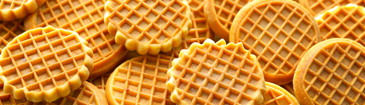 Top view of many waffle baked eggo households favored frozen eggo waffles. Waffles as background. Banner, advertisement, template.