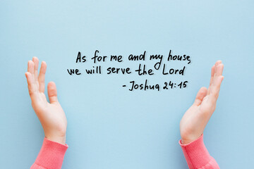 Christian biblical verse - We will serve the Lord.. - text on light blue background with praising...