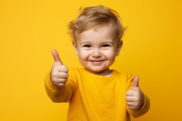 Adorable Toddler Giving Thumbs Up - Happy Child Portrait