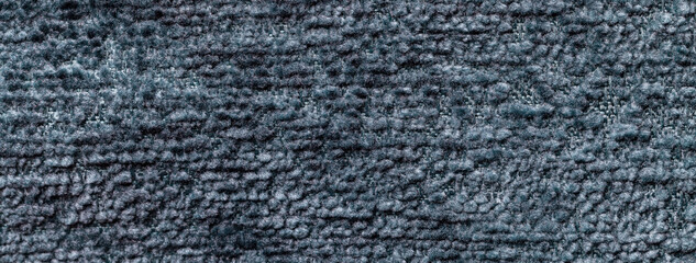Texture dark blue background from textile material. Abstract backdrop from denim fabric, macro.