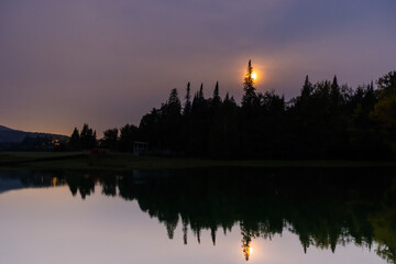 Full moon over the lake in mont Tremblant national park, Canada