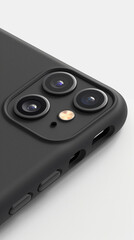Obraz premium Close-Up of Modern Smartphone with Triple Camera and Black Case on White Background