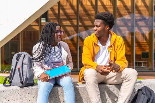 African american students chatting relaxed outside the university
