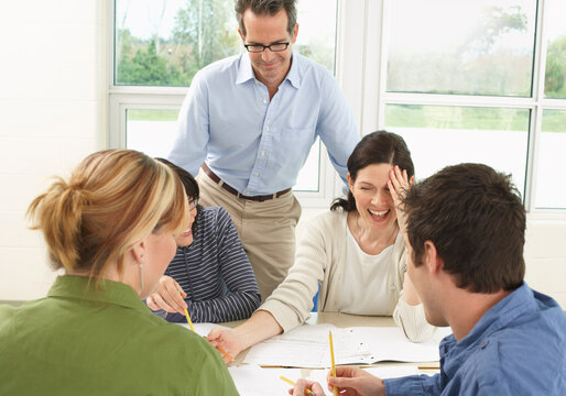 Students and Teacher Working in Group