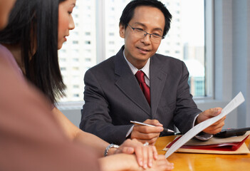 People Meeting with Financial Advisor