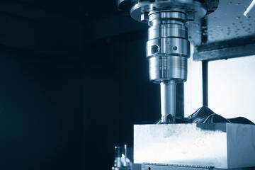 The CNC milling machine rough cutting the injection mold parts by indexable tools.