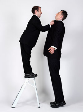 Short and Tall Businessmen