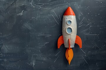 Back to school banner with paper rocket on blackboard