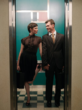 Business People in Elevator