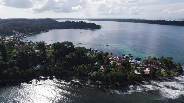 Coastal village on Bastimentos Island, Panama, surrounded by lush greenery and calm waters