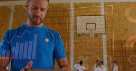 Analyzing data on tablet, coach in gym with binary code animation over hoop - Powered by Adobe