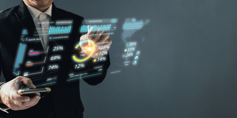 Business online digital market management. man use graphs to report and progress of business and analyze finances, and investments. Use technology to plan strategy to success goals and growth stock.