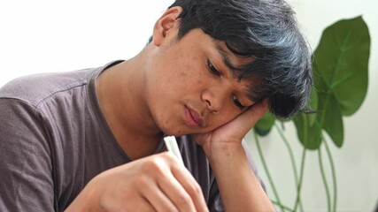 Asian Man Having No Appetite To Eat. Eating Disorder. Depression Problem