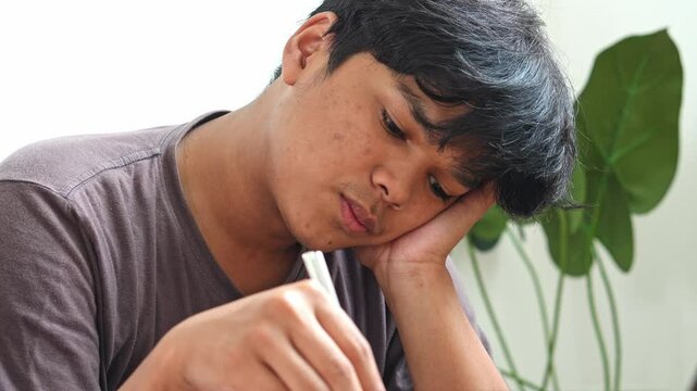 Asian Man Having No Appetite To Eat. Eating Disorder. Depression Problem
