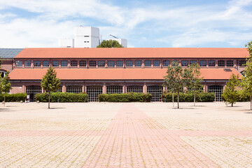 Courtyard with the buildings of the Fabbrica del Vapore in Milan