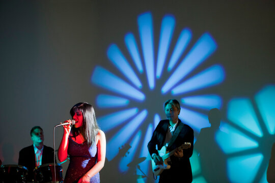 Singer and Band Performing