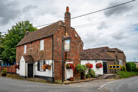 The Bat and Ball an 18th century pub known as the cradle of cricket stands opposite Broadhalfpenny Down on the Hambledon, Clanfield border.