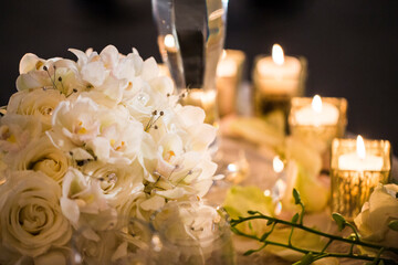 Bouquet and Candles on Table at Wedding Reception