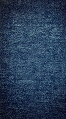 Fototapeta premium A textured blue denim background suitable for design and fashion applications.