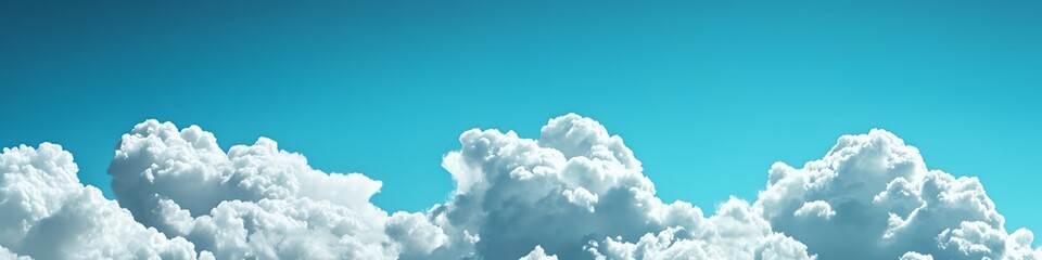 Naklejka premium A serene sky filled with fluffy clouds against a bright blue backdrop.