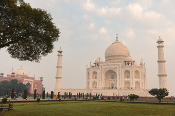 Taj Mahal and tourists enjoying the grounds; Agra, Uttar Pradesh, India