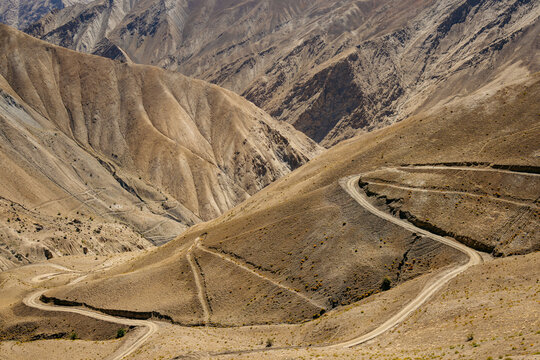 Road winding across the barren mountainside between Zangla and Wanla, Zanskar, Ladakh; Zanskar, Ladakh, India