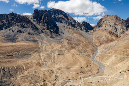 Arid and rugged mountainous landscape with a road between Zangla and Wanla, Zanskar, Ladakh; Zanskar, Ladakh, India