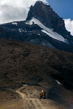 Earth mover equipment in the Himalayas, creating the road between Zangla and Wanla, Ladakh, India; Zanskar, Ladakh, India