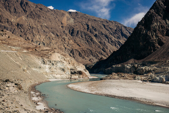 Beautiful landscape with a river flowing through a valley in a mountainous region along the Diskit - Turtuk Highway in Ladakh; Ladakh, India