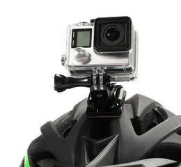 Naklejka premium Modern action camera on helmet against white background