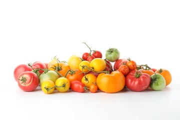 Different sorts of fresh ripe tomatoes isolated on white