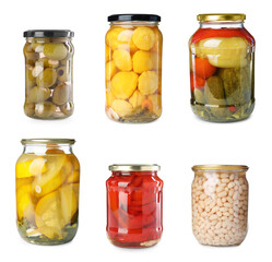 Glass jars with different pickled foods on white background, set