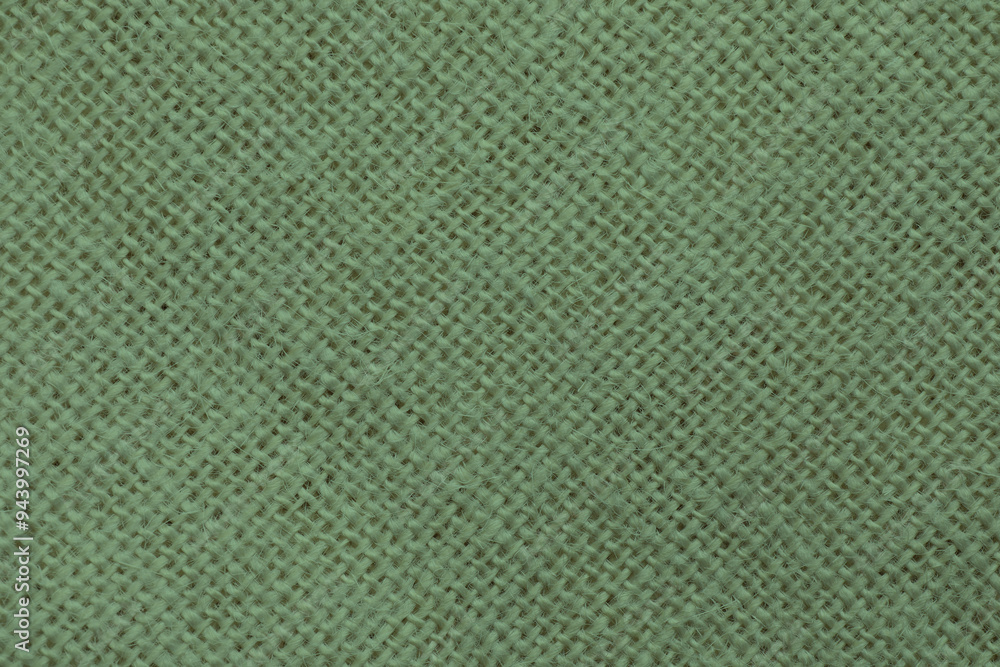 Sticker Sage color fabric as background, top view