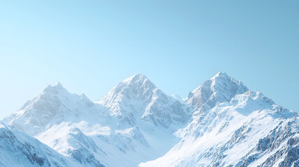 Majestic snow capped mountains rise against clear blue sky, evoking sense of tranquility and awe.