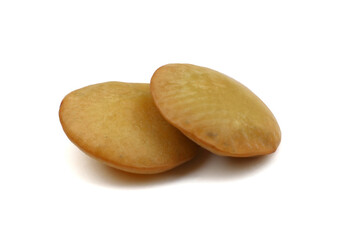 Heap of green lentils isolated on white background. Dry green lentils (Lens culinaris) close up. Top view.