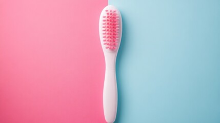 Toothbrush on Pink and Blue Background