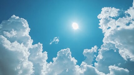 Bright Blue Sky with Fluffy Clouds and Sun
