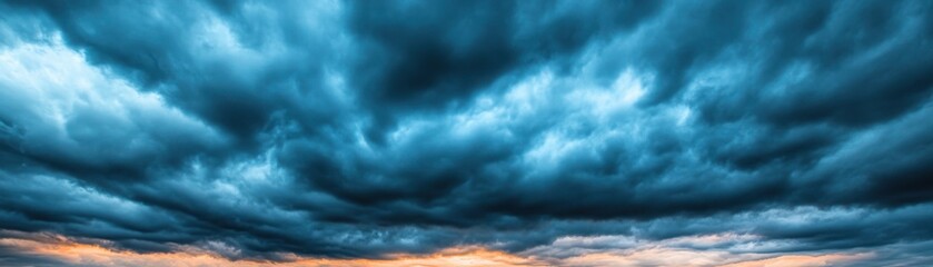 Obraz premium Dark clouds with the sun breaking through, stormy weather, dramatic lighting