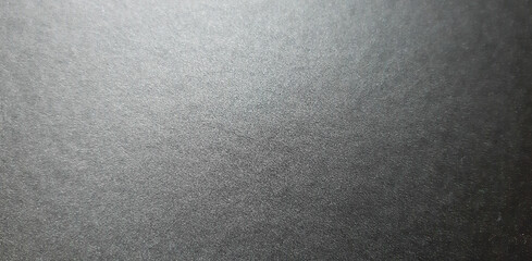 abstract dark paper texture, close-up textured surface, beautiful background and wallpaper with space for design