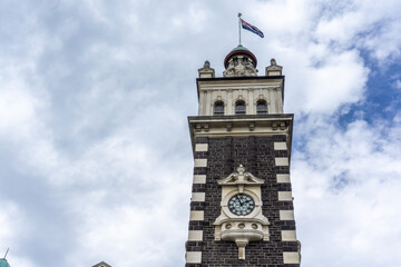 Gothic splendor of Dunedin's cathedral and its historic train station, iconic landmarks on New Zealand's South Island. Perfect for architecture enthusiasts, urban explorers, and history Victorian 