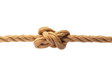 Fototapeta premium A close-up of a tightly tied rope knot, showcasing the texture and strength of natural fibers against a plain background.